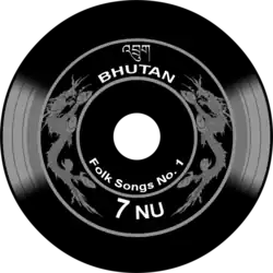 Sello butanés con forma de disco de vinilo.Tiene la capacidad de reproducir el himno nacional de Bután.