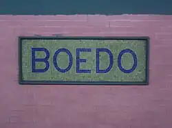 Cartel hecho con venecitas