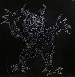 Monstruo con cuernos y garras en actitud amenazante.