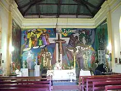 en la imagen se ve un mural de estilo cubista que representa la ultima cena . Realizado por el Pintor Oscar Enrique Levaggi