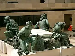 Cautivos del monumento a Luis XIV en Place des Victoires, de Martin Desjardins (1679)[Nota 5]​