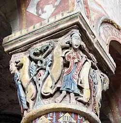 Capitel historiado con la escena de Daniel en el pozo de los leones. Sainte Radegonde.