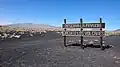 Cartel de ingreso al circuito Los Volcanes