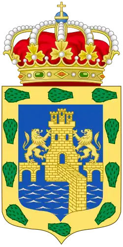 Escudo de armas de la Ciudad de México, otorgado por Carlos V; las únicas reminiscencias al pasado mexica en ella son el lago y las pencas.