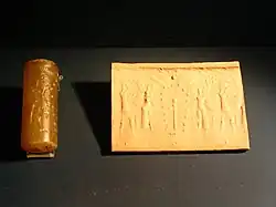 Veneración de un árbol sagrado por genios.