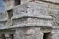 Mascarón de estuco en Tulum