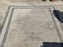 Mosaico con el símbolo de la diosa púnico-fenicia Tanit.