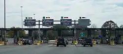 Multi-lane toll plaza with cash and E-ZPass lanes