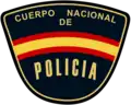 Antiguo emblema del Cuerpo Nacional de Policía (CNP)