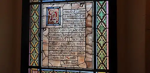 Vidriera que relata el milagro del niño Romualdo.