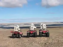 Crew 7 members on a motorized EVA.