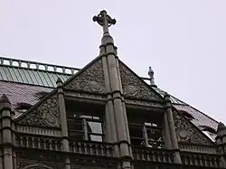 A gable with a window at the top of the building's facade
