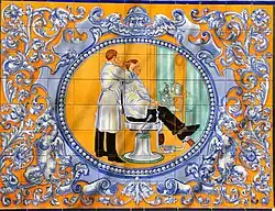 Orla talaverana de los ceramistas Ginestal y Machuca, para la Peluquería Casin, en la calle Embajadores, 31. Hacia 1912-20.[19]​