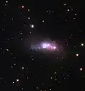 Galaxia enana compacta azul ESO 338-4.[14]​