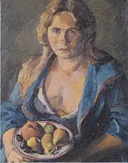 La esposa del artista con un plato de frutas (1925), colección privada