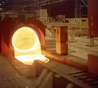 Detalle de un formador de espiras en un tren de alambrón.