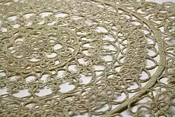 Simetría rotacional en un encaje: encaje de bolillos