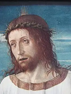 Dobladilo pseudocúfico en Le Christ Bénissant de Giovanni Bellini , 1465–1470. Museo del Louvre.