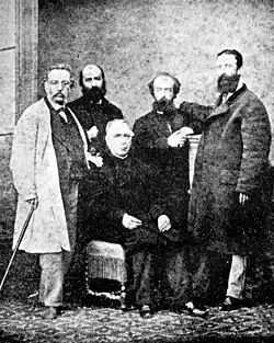 Fernando Garrido, Élie Reclus, José María Orense (sentado), Aristide Rey y Giuseppe Fanelli, fotografía de 1869.