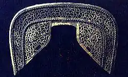 Panel de bronce calado.