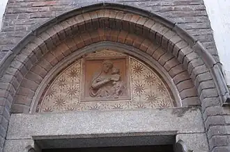 Luneto del portal lateral