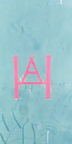 Estirpe de la casa de esquileo en una puerta.