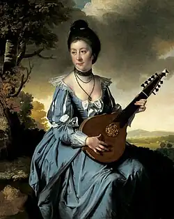 Retrato de la Sra. de Robert Gwillym tocando una guitarra inglesa, pintura de Joseph Wright (1766). Museo de Arte de San Luis.