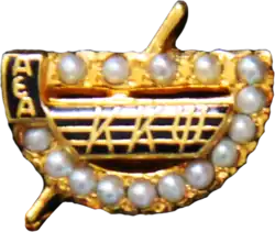 Crown Pearl Badge of Kappa Kappa Psi.