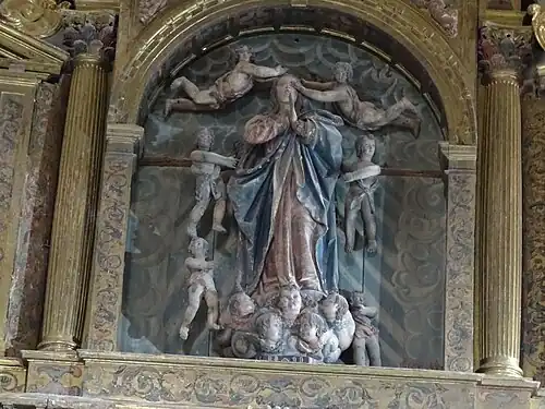 Detalle del retablo mayor. Escultura de la Asunción, influencia de Gregorio Fernández.