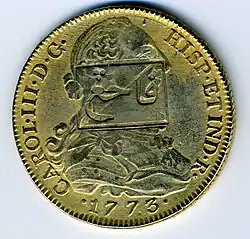 Anverso de moneda de 8 reales (plata) de Carlos III de 1773 resellada en Malasia.