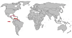 Distribución de Phoenicopterus ruber, de rojo los lugares donde habita permanentemente, de amarillo los lugares donde fueron reintroducidos y de naranja los lugares donde habitan por temporadas.