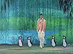 Bert bailando con los pingüinos