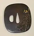 Tsuba de cobre con la imagen de Shōki, obra de Masayuki Tsuba (1695-1769).