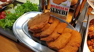 Milanesa de surubí.