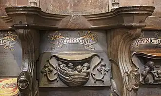 Sede del Archidiácono de Brecon en el coro de la Catedral de St David, Gales, mostrando la misericordia