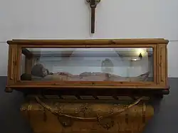 Yacente que estaba colocado en el banco del retablo mayor