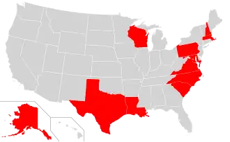 "A map of the United States with Alaska, Wisconsin and Texas in red along with a swathe of the north eastern states."