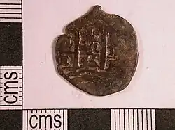 Un real de Felipe IV de España, incluye la marca P que indica que fue acuñada en Potosí, 1656. Reverso.