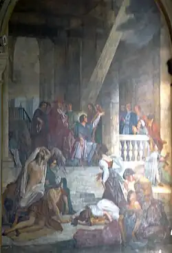 San Roque rogando por la curación de los leprosos.