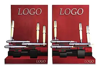 Expositor de sobremesa [exhibidor de mostrador] con bolígrafos