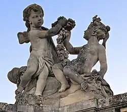 Hacia el palacio: niños con flores. La primavera.