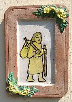 Señal de la Vía Francígena en la abadía de San Albino.