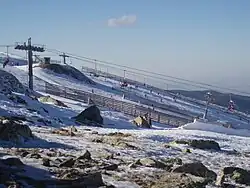 Cabeceras de dos pistas azules de Valdesquí.