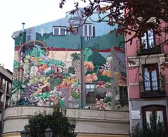 Pintura urbana en una pared de Puerta Cerrada (Madrid), de Alberto Corazón, 1983.[65]​