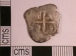 Un real de Felipe IV de España, incluye la marca P que indica que fue acuñada en Potosí, 1656. Anverso.