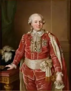 Retrato de Samuel af Ugglas vestido con traje de época color rojo y detalles dorados. Lleva capa y cinturón del mismo color. La mano derecha reposa sobre un escritorio.