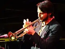 Concierto de Joan Mar Sauqué en el XXVI Festival Internacional de Jazz de San Javieren el auditorio Parque Almansa. Joan Mar Sauqué: trompeta. Champian Fulton: piano y voz. Lluc Casares: saxo, Joan Casares: batería. Giuseppe Campisi: contrabajo.