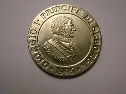 Reverso de una moneda de Luigino
