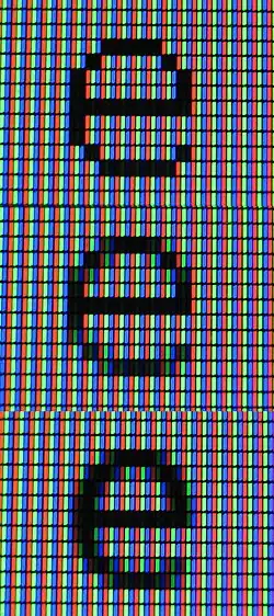 Composite macro photograph of three types of rendering for e: monochrome, traditional antialiasing, subpixel rendering (from top)