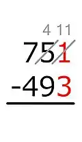 1 − 3 = no es posible. Añadimos un 10 al 1. Debido a que el 10 es «prestado» desde el 5 cercano, el 5 se baja en 1.